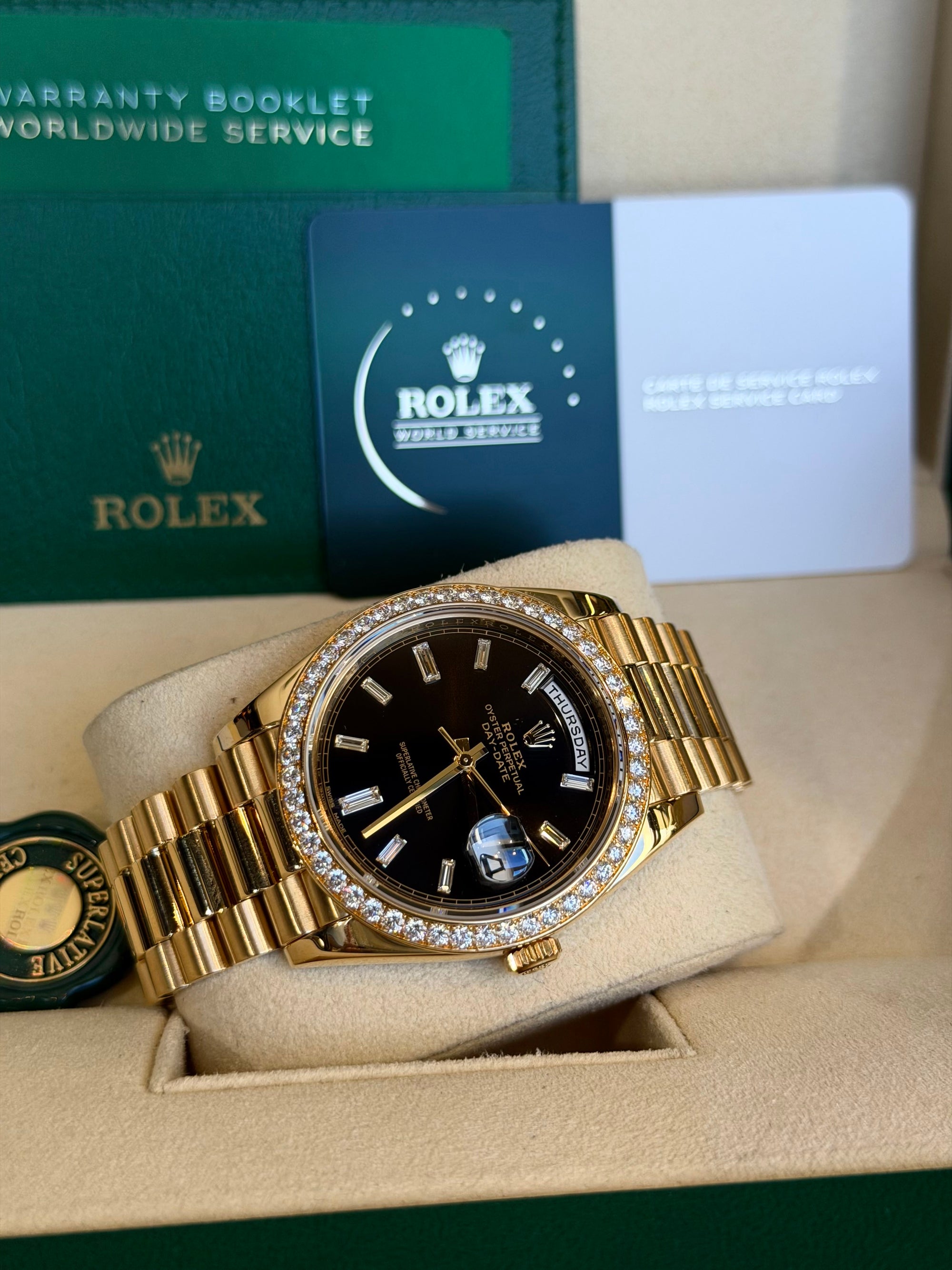 Rolex Day-Date 40 Black Baguette Diamond Dial on President 228348RBR Service Papers